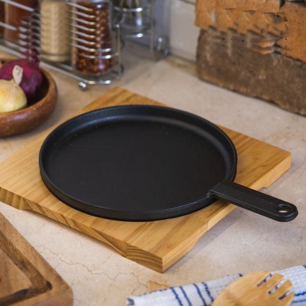 Frying Pan and Wooden Base Board - Durable frying pan with a heat-resistant wooden base, perfect for serving sizzling dishes